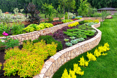 Colorful natural garden with stone terraces.